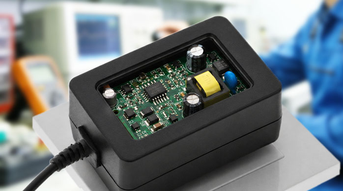 An advanced constant power IC chip visible inside a high-performance power adapter housing