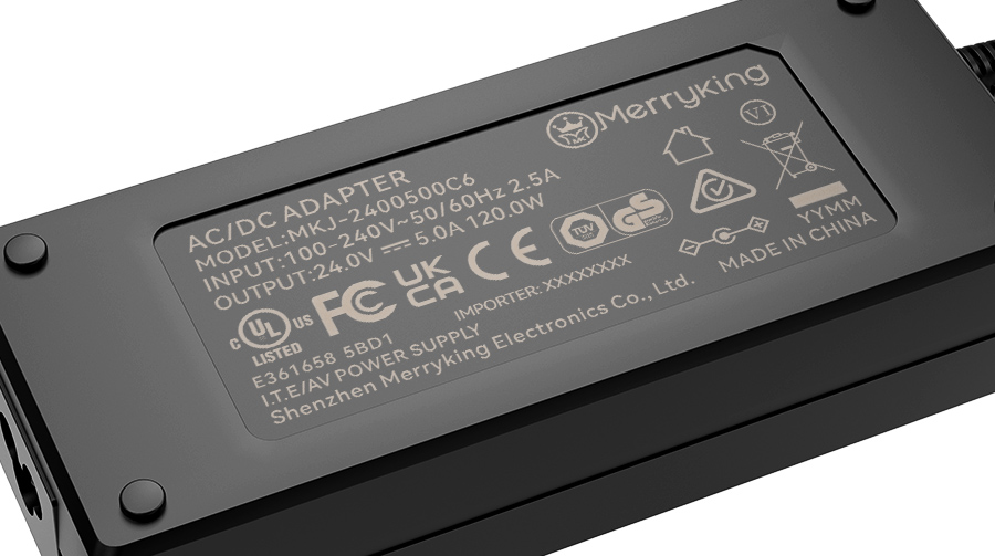 Studio Close-up of Laptop Adapter with Safety Certification Logos